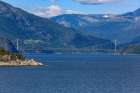 Eidfjord, Norway. Hardanger Bridge and lighthouse. Art Print